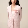 Blazer jacquard con spilla