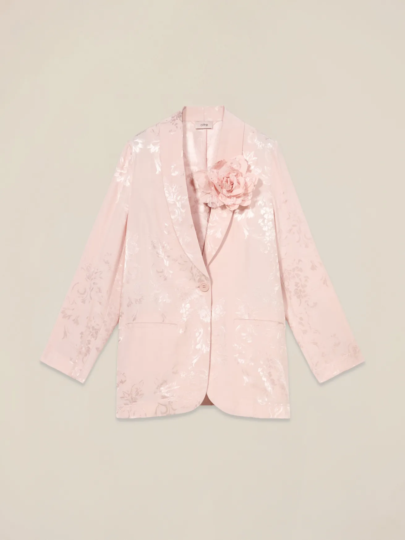 Blazer jacquard con spilla