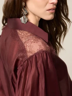 Blusa con inserti in pizzo
