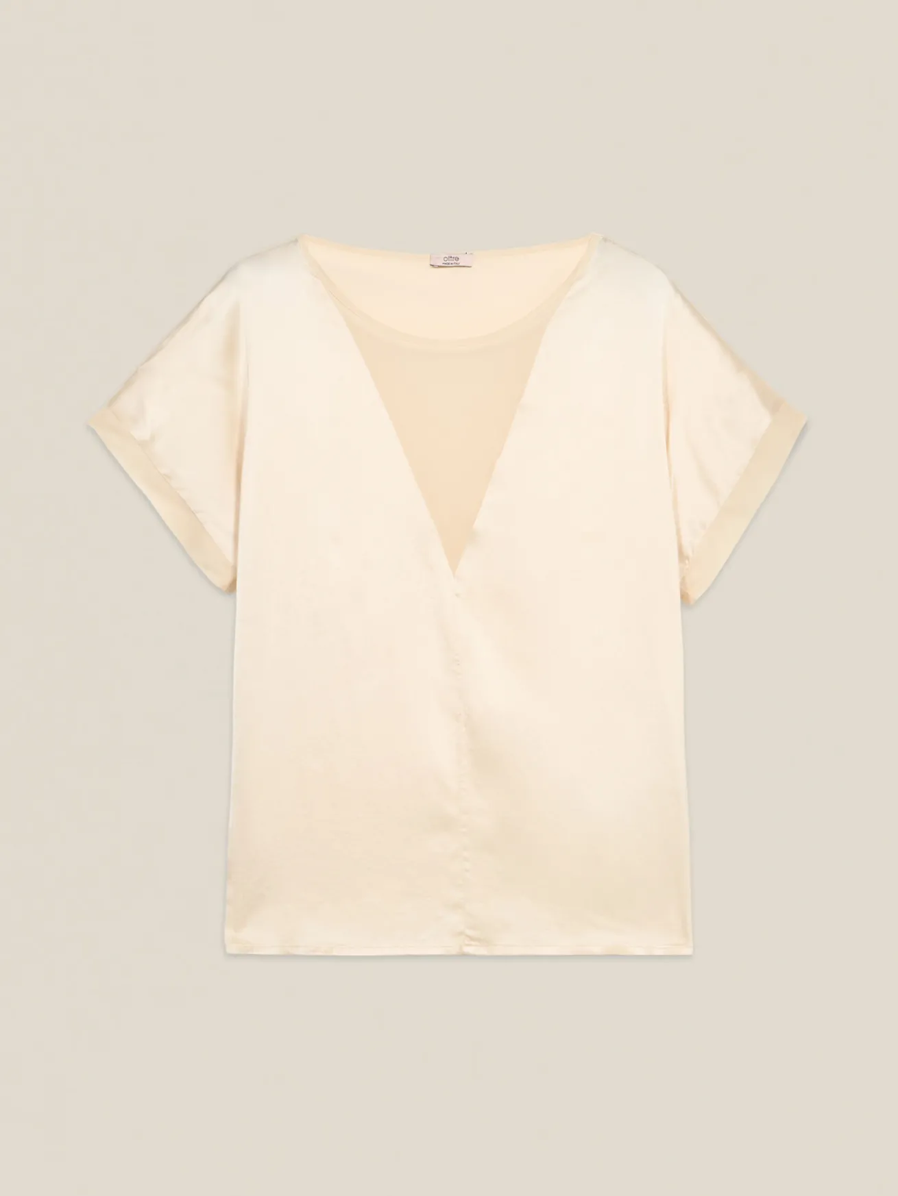 Blusa con inserto see-through