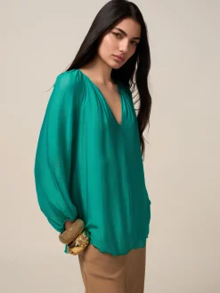 Blusa fluida misto seta