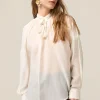 Blusa in mussola misto seta