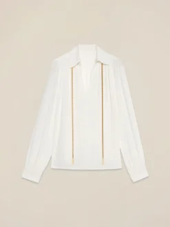 Blusa in tessuto crêpe con catena