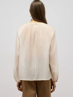 Blusa in voile con volants