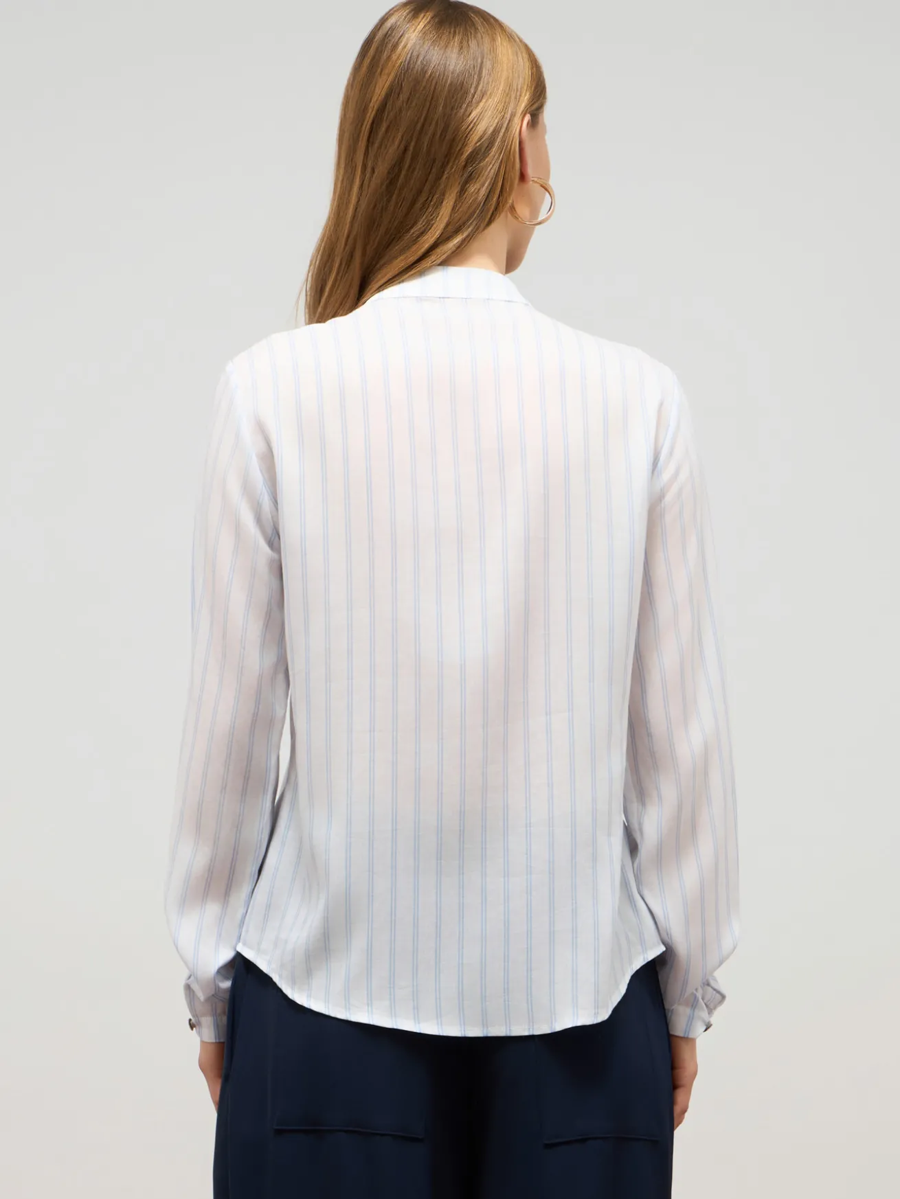 Camicia a righe con volant