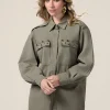Camicia oversize con applicazioni