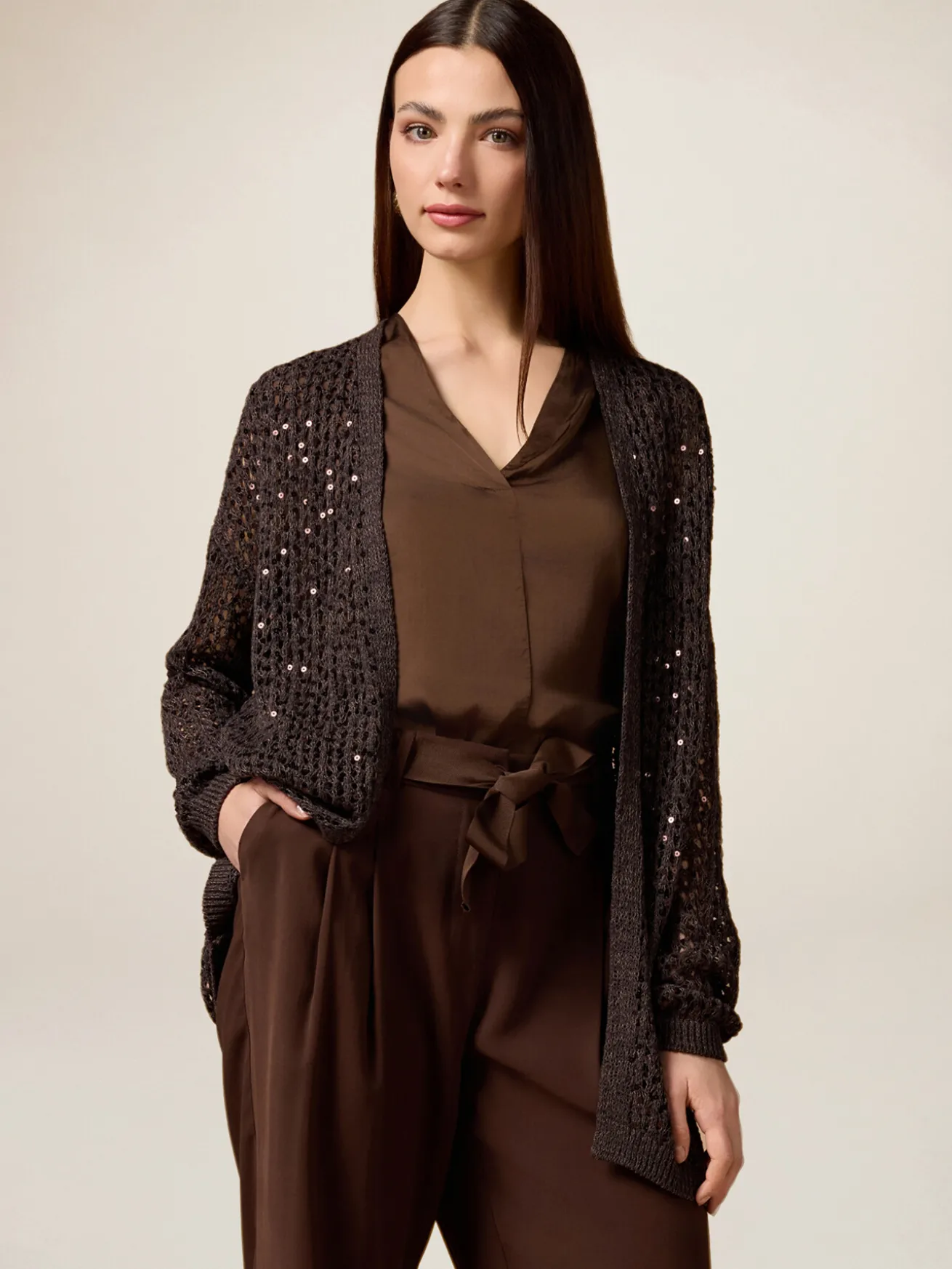 Cardigan traforato con paillettes
