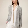 Cardigan traforato con paillettes