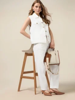 Chinos in cotone in cotone con ricami floreali