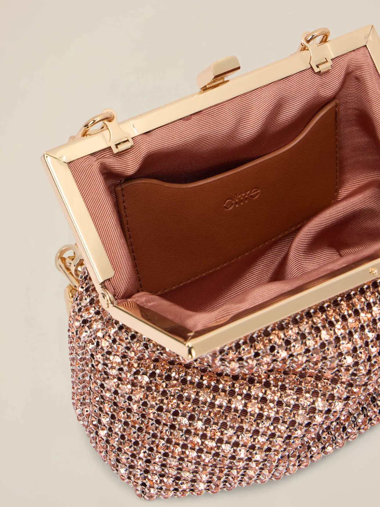 Clutch con cristalli e chiusura a scatto