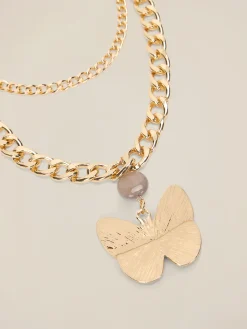 Collana in metallo con ciondolo a farfalla