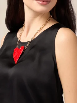 Collana metallica con maxi ciondolo a forma di cuore