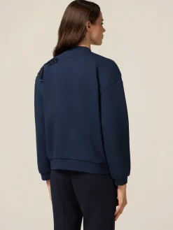 Felpa con zip e ricamo gioiello