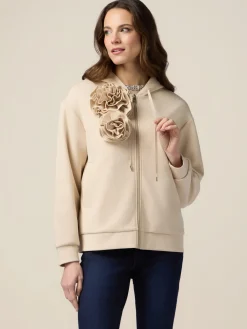 Felpa con zip e spille e fiore
