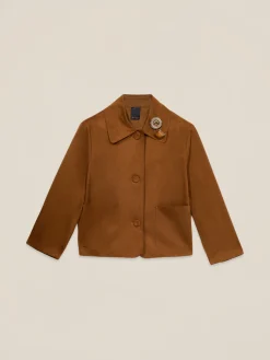 Giacca boxy con spilla gioiello