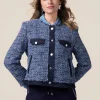 Giacca in tweed con dettagli in denim