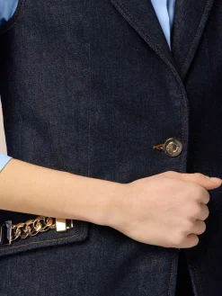 Gilet denim con catene metalliche