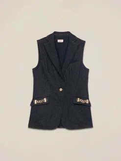 Gilet denim con catene metalliche