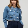 Giubbotto in denim con applicazioni