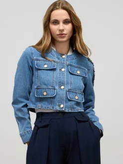 Giubbotto in denim con applicazioni