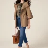 Jeans con cintura e fibbia gioiello