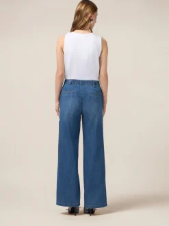 Jeans palazzo con ricami decorativi