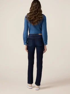 Jeans regular blu rinse con bottoni dorati
