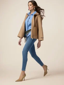 Jeans skinny con bottone gioiello