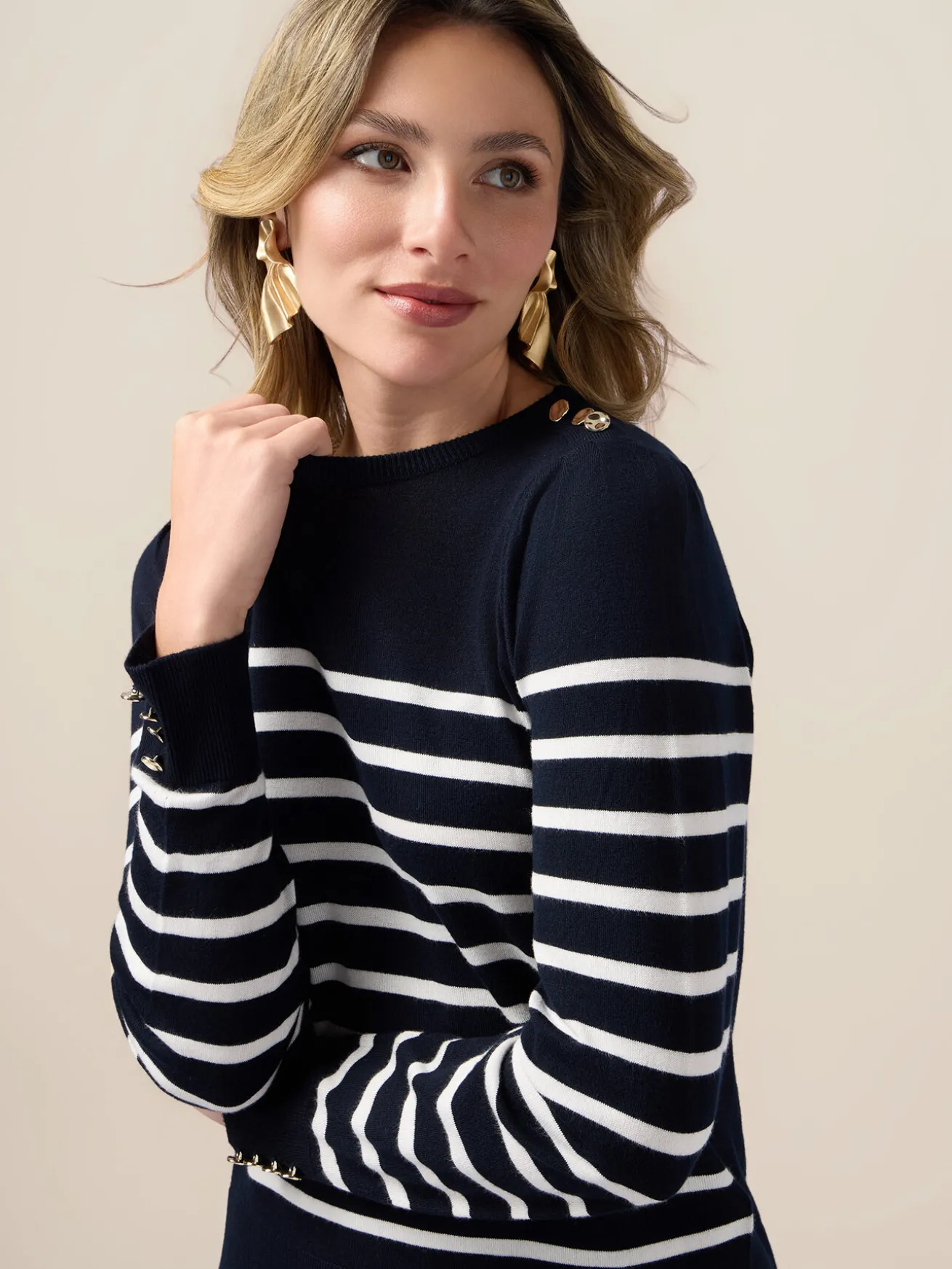 Maglia a righe con bottoni metallici