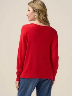 Maglia boxy con bottoni sul fondo maniche