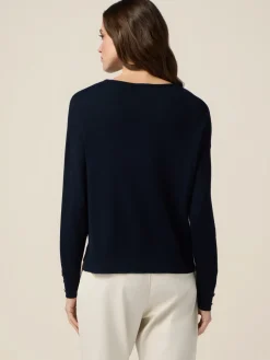 Maglia boxy con bottoni sul fondo maniche