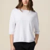 Maglia con pioggia di borchiette/strass