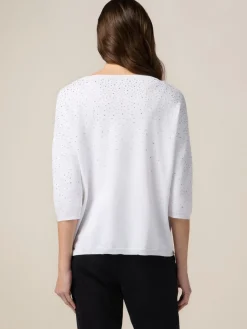 Maglia con pioggia di borchiette/strass
