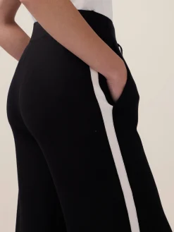 Pantaloni in maglia con profili a contrasto