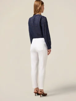 Pantaloni skinny in cotone e tencel con bottone gioiello