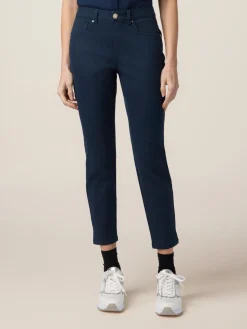 Pantaloni skinny in cotone e tencel con bottone gioiello