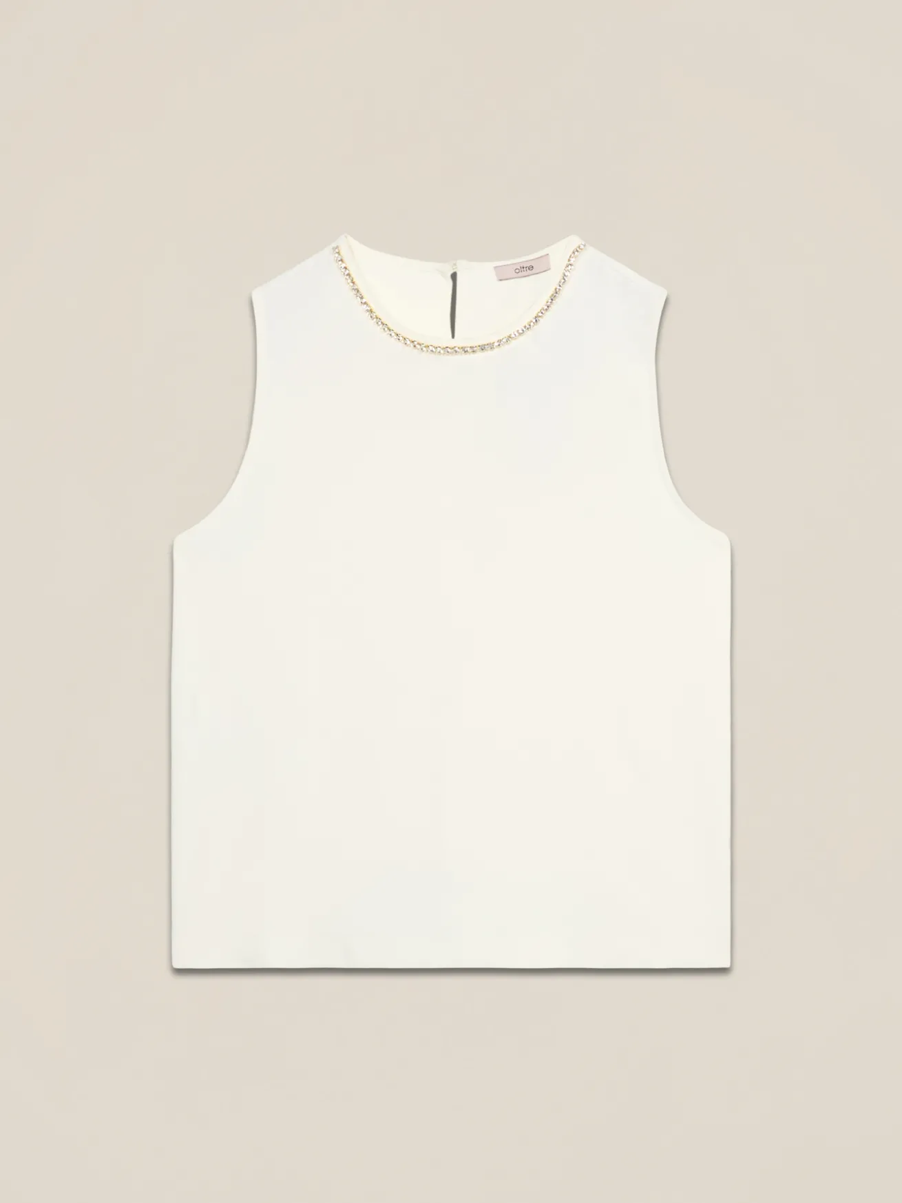 Top fluido con applicazioni decorative