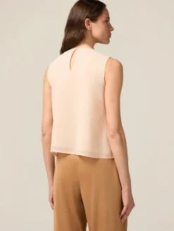 Top in georgette con applicazioni