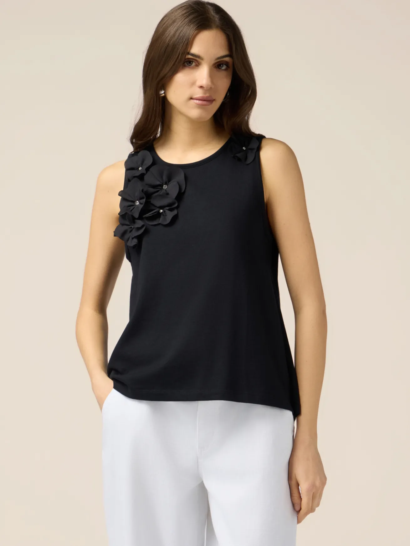 Top in jersey con applicazioni floreali