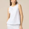 Top in jersey con applicazioni floreali