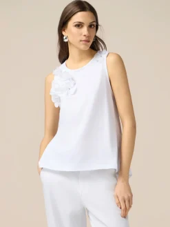 Top in jersey con applicazioni floreali