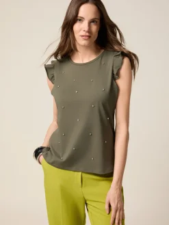 Top in jersey con castoni