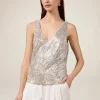 Top in tulle con paillettes