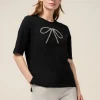 T-shirt con fiocco in strass