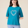 T-shirt con ricamo in paillettes