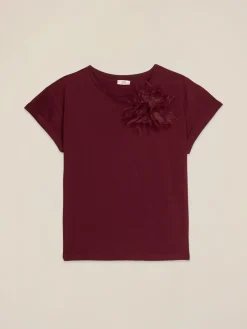 T-shirt con spilla a fiore