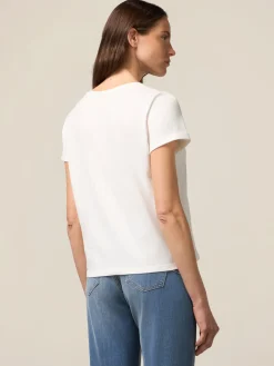 T-shirt con stampa e applicazioni