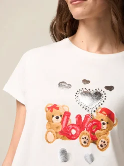 T-shirt con stampa e applicazioni
