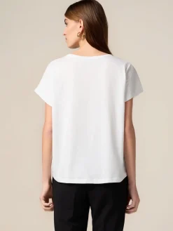 T-shirt in cotone con applicazioni