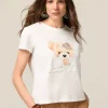 T-shirt in cotone con stampa e applicazioni